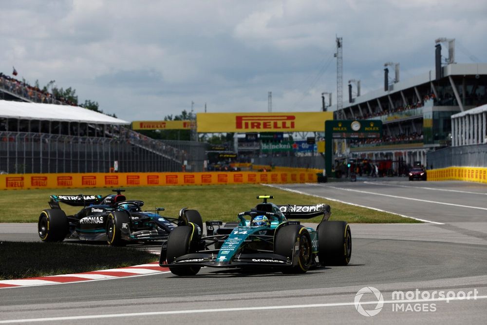 Fernando Alonso, Aston Martin AMR23, George Russell, Mercedes F1 W14
