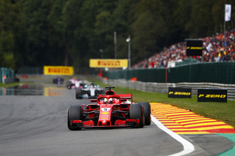 Sebastian Vettel, Ferrari SF71H, leads Lewis Hamilton, Mercedes AMG F1 W09