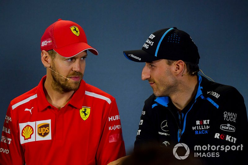 Sebastian Vettel, Ferrari and Robert Kubica, Williams Racing in Press Conference