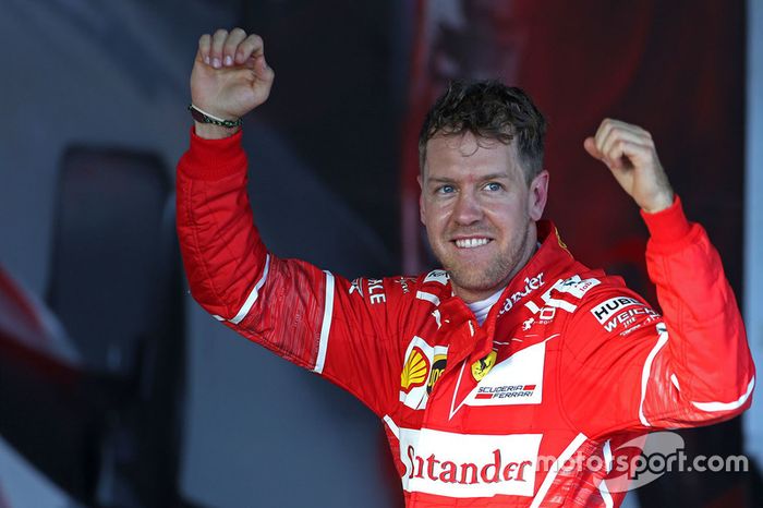 El ganador Sebastian Vettel, Ferrari