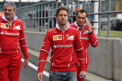 Sebastian Vettel, Ferrari walks the track, Maurizio Arrivabene, Ferrari Team Principal and Riccardo Adami, Ferrari Race Engineer