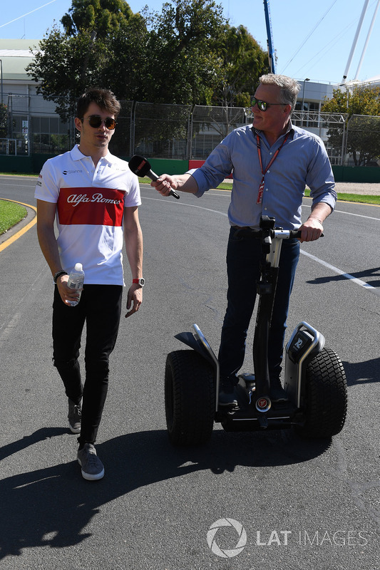Charles Leclerc, Alfa Romeo Sauber F1 Team walks the track and talks with Johnny Herbert, Sky TV