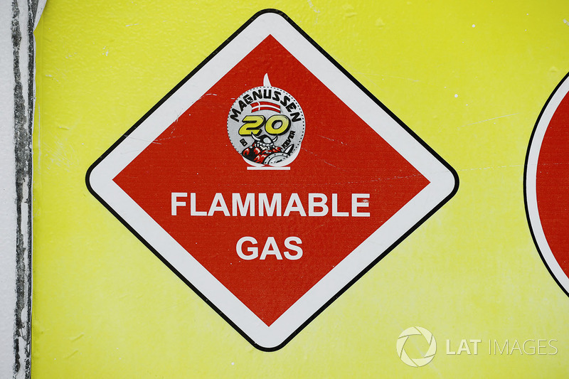 A flammable gas sign in the Haas F1 Team garage