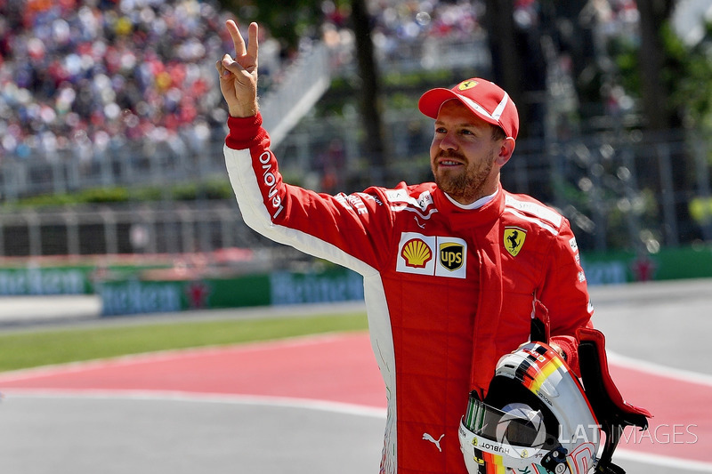 Pole sitter Sebastian Vettel, Ferrari celebrates in parc ferme