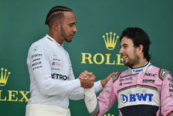Lewis Hamilton, Mercedes-AMG F1 and Sergio Perez, Force India celebrate on the podium