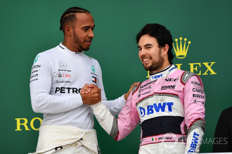 Race winner Lewis Hamilton, Mercedes-AMG F1 and Sergio Perez, Force India celebrate on the podium