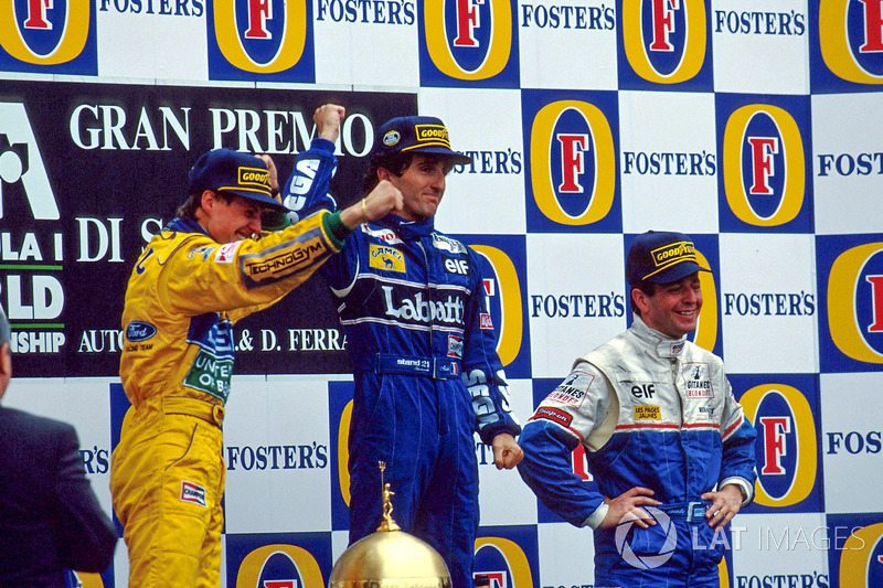 Podium: race winner Alain Prost, second place Michael Schumacher, third place Martin Brundle