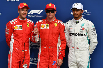 (L to R): Sebastian Vettel, Ferrari, Kimi Raikkonen, Ferrari and Lewis Hamilton, Mercedes AMG F1 celebrate in parc ferme