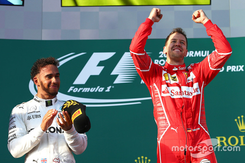 Sebastian Vettel, Ferrari; Lewis Hamilton, Mercedes AMG F1