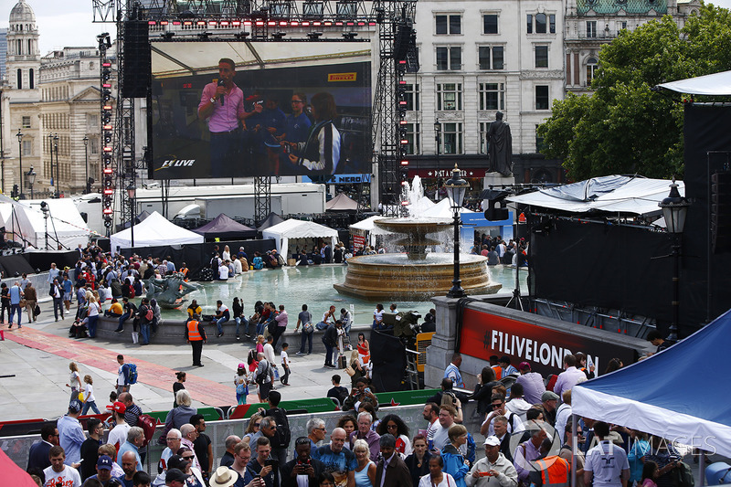 Fans watch the big screen entertainment in Trafalgar Square