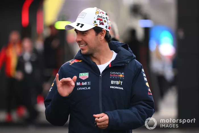 Sergio Perez, Red Bull Racing, arrives at the track