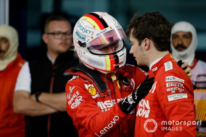 Sebastian Vettel, Ferrari, parla con il suo compagno di squadra Charles Leclerc, Ferrari, 3° classificato, dopo la gara