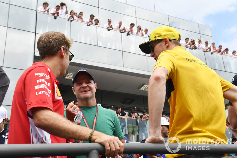Себастьян Феттель, Ferrari, Рубенс Баррікелло та Ніко Хюлькенберг, Renault Sport F1