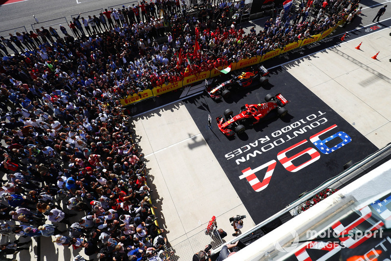 Kimi Raikkonen, Ferrari SF71H, parla con i media dopo aver parcheggiato la sua monoposto nel parco chiuso, con quella di Max Verstappen, Red Bull Racing RB14