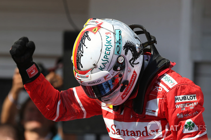 Il vincitore della gara Sebastian Vettel, Ferrari