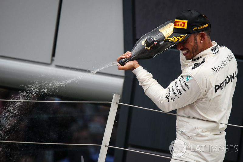 Race winner Lewis Hamilton, Mercedes AMG F1 celebrates on the podium