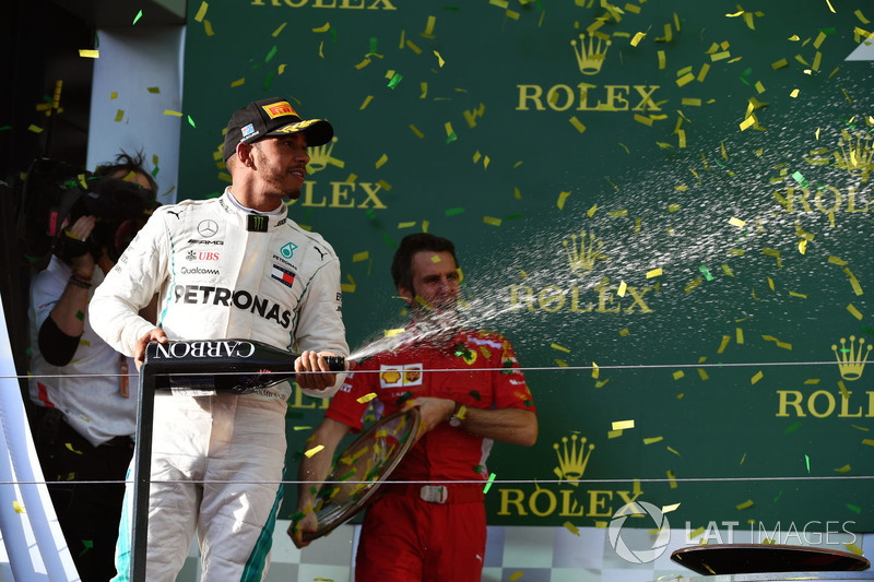 Lewis Hamilton, Mercedes-AMG F1 celebrates on the podium with the champagne