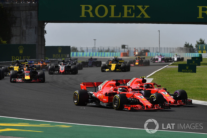 Sebastian Vettel, Ferrari SF71H et Kimi Raikkonen, Ferrari SF71H en lutte