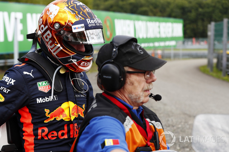 Max Verstappen, Red Bull Racing on a motorcycle after retiring