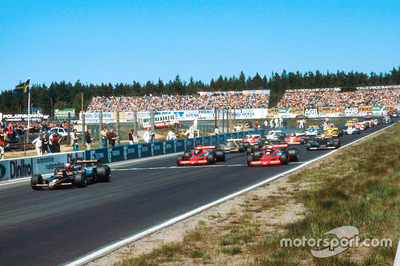 Mario Andretti, Lotus 79 Ford, leads John Watson and Niki Lauda, both Brabham BT46B, at the start