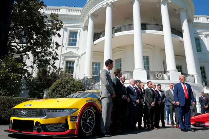 U.S. President Donald Trump, Roger Penske, Joey Logano, Ryan Blaney