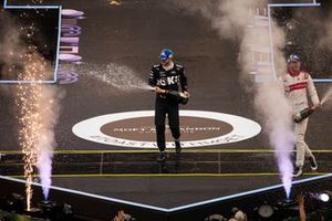 Edoardo Mortara, Venturi Racing, 1st position, Jake Dennis, Andretti Motorsport, 3rd position, spray Champagne on the podium