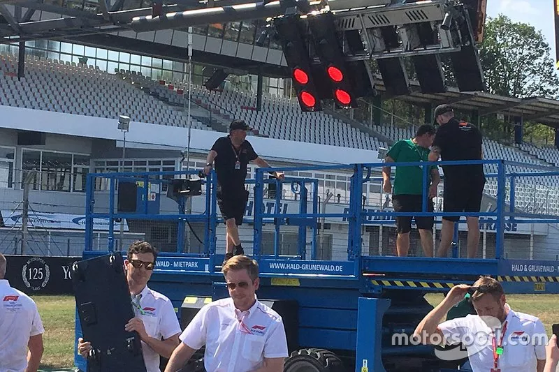 Broken German GP start lights after a bus crashed into them