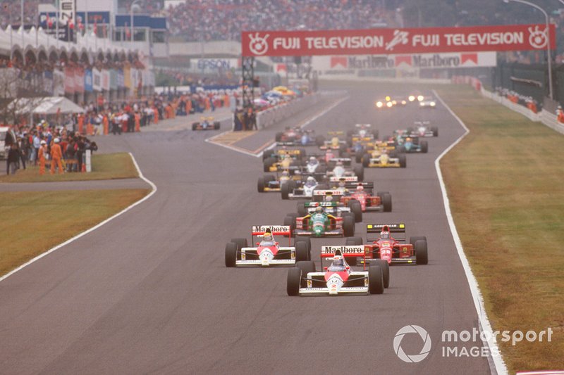 Alain Prost, McLaren leads Ayrton Senna at the start