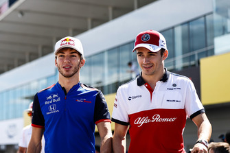 Pierre Gasly, Scuderia Toro Rosso, with Charles Leclerc, Sauber