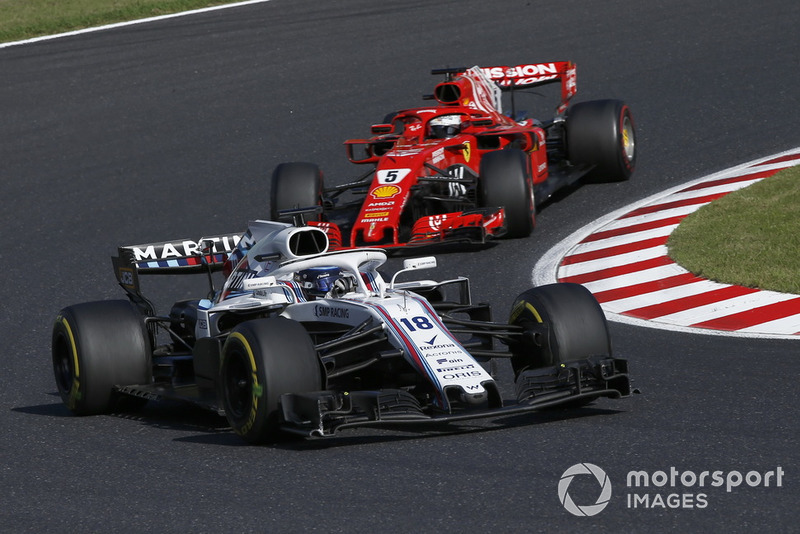 Lance Stroll, Williams FW41 e Sebastian Vettel, Ferrari SF71H