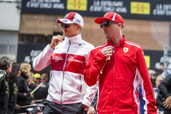 Marcus Ericsson, Sauber and Kimi Raikkonen, Ferrari