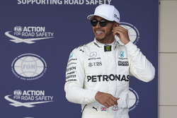 Polesitter Lewis Hamilton, Mercedes AMG F1, celebrates