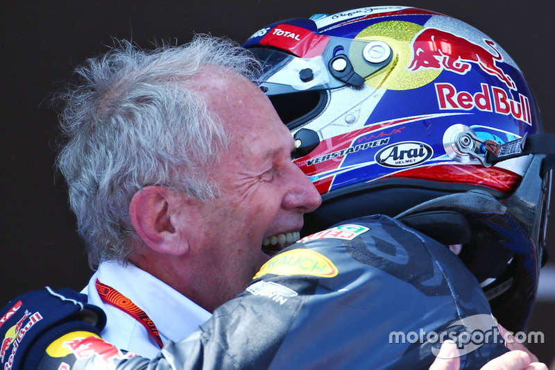 (L to R): Race winner Max Verstappen, Red Bull Racing celebrates with Dr Helmut Marko, Red Bull Moto