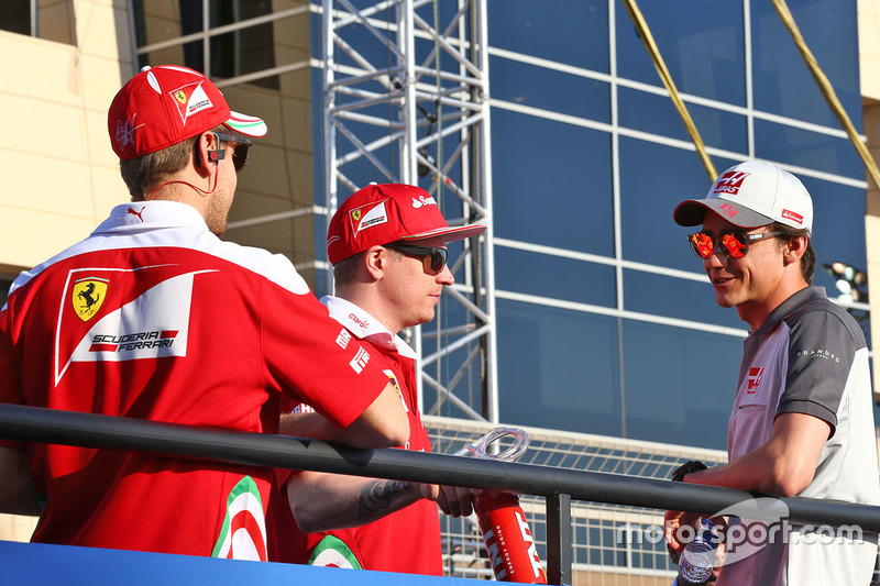 Sebastian Vettel, Ferrari, Kimi Raikkonen, Ferrari and Esteban Gutierrez, Haas F1 Team