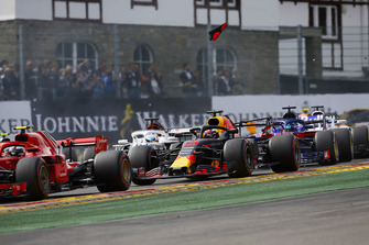 Kimi Raikkonen, Ferrari SF71H, Daniel Ricciardo, Red Bull Racing RB14, Marcus Ericsson, Sauber C37, and Brendon Hartley, Toro Rosso STR13