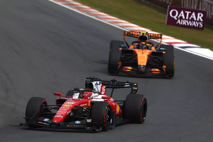 Charles Leclerc, Ferrari; Lando Norris, McLaren
