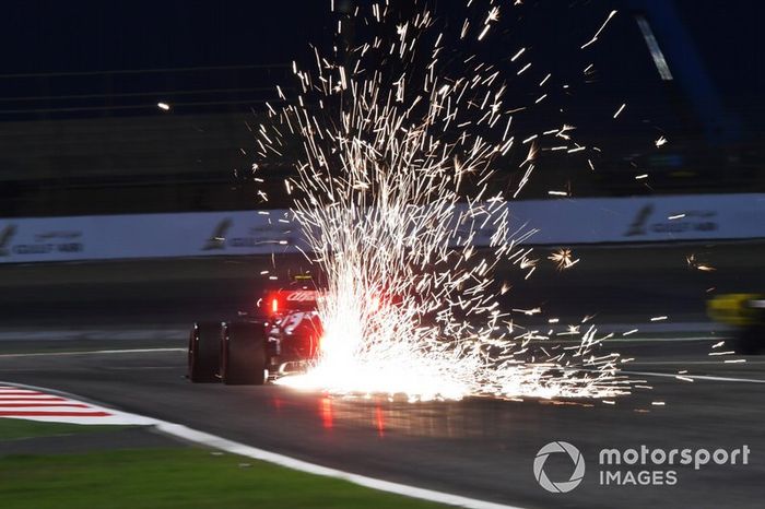 Sparks fly from the rear of Antonio Giovinazzi, Alfa Romeo Racing C38