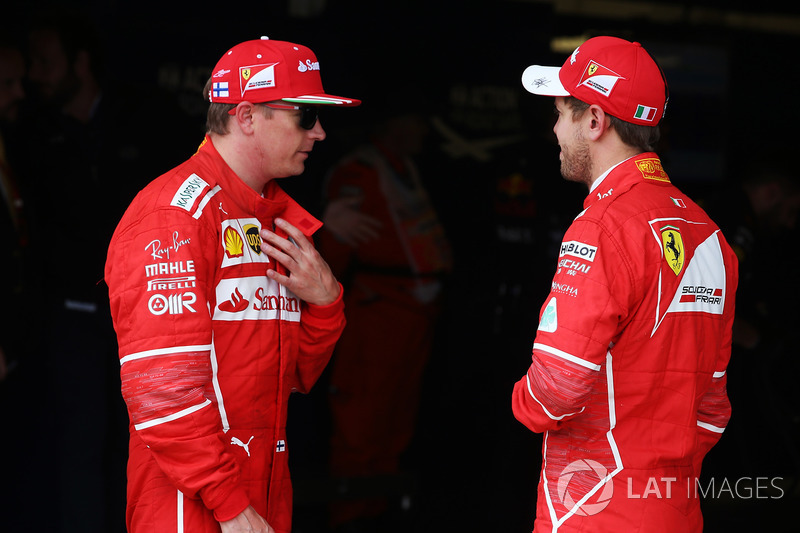 Kimi Raikkonen, Ferrari, con Sebastian Vettel, Ferrari