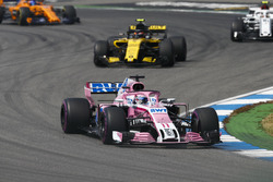 Sergio Perez, Force India VJM11, leads Carlos Sainz Jr., Renault Sport F1 Team R.S. 18, and Charles Leclerc, Sauber C37