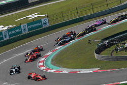Sebastian Vettel, Ferrari SF71H leads at the start of the race