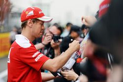 Sebastian Vettel, Ferrari signs autographs for the fans