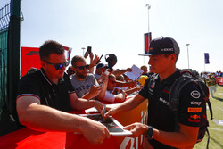 Max Verstappen, Red Bull Racing, signs autographs for fans