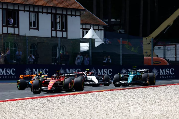 Carlos Sainz, Ferrari SF-23, Fernando Alonso, Aston Martin AMR23, Yuki Tsunoda, AlphaTauri AT04
