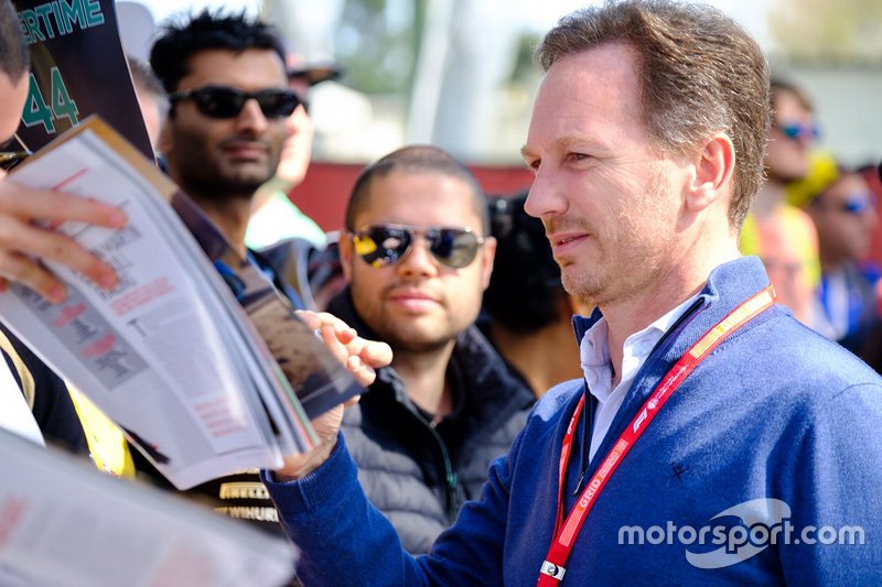 Christian Horner, Team Principal Red Bull Racing signs autographs for fans