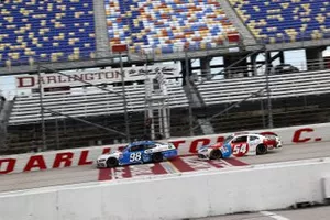Chase Briscoe,  Stewart-Haas Racing Ford leads Kyle Busch, Joe Gibbs Racing Toyota