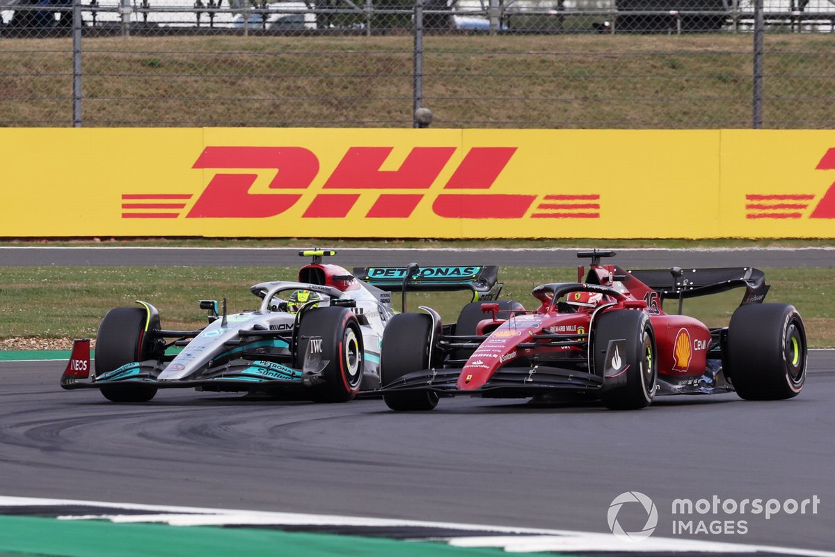 Lewis Hamilton, Mercedes W13, battles with Charles Leclerc, Ferrari F1-75