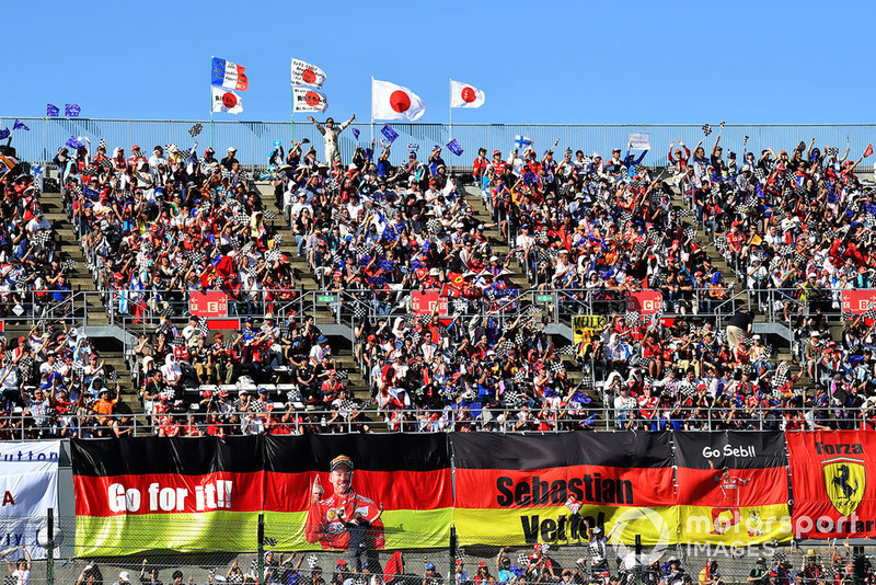 Sebastian Vettel, Ferrari and Kimi Raikkonen, Ferrari fans and banners