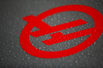 Haas F1 logo with rain water