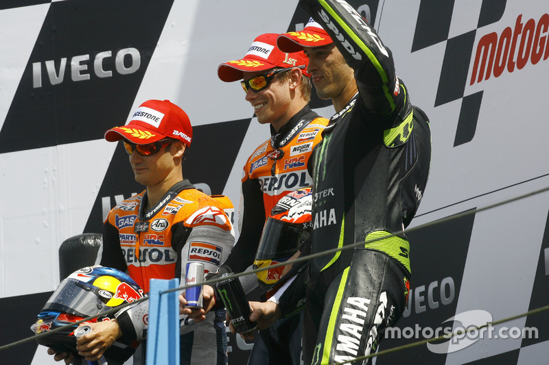 Podium: second place Dani Pedrosa; Winner Casey Stoner, Honda; third place Andrea Dovizioso, Yamaha