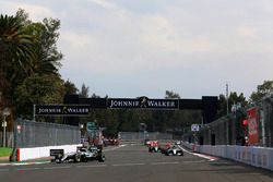 Lewis Hamilton, Mercedes AMG F1 W07 Hybrid, leads Nico Rosberg, Mercedes AMG F1 W07 Hybrid, and Max Verstappen, Red Bull Racing RB12, at the start of the race